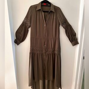 FILOMENA FERNANDEZ, unique Miami-based designer. Brown dress.